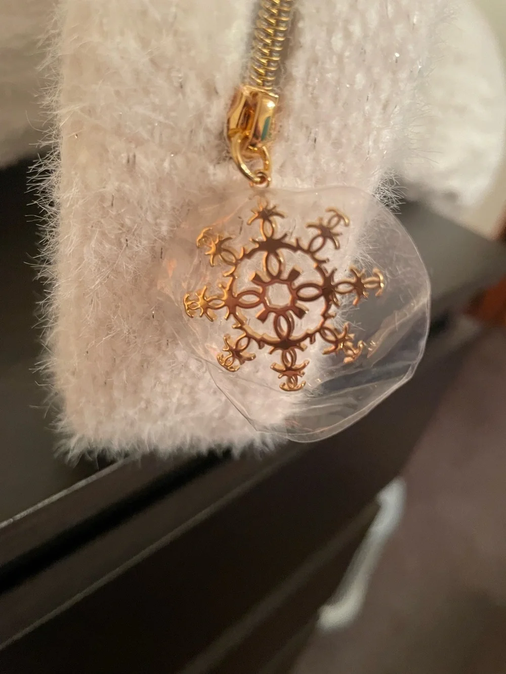 CHANEL white Faux-Fur makeup Case with Gold Logo